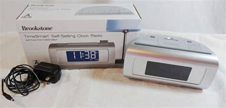 How do I set the alarm on my Brookstone clock?